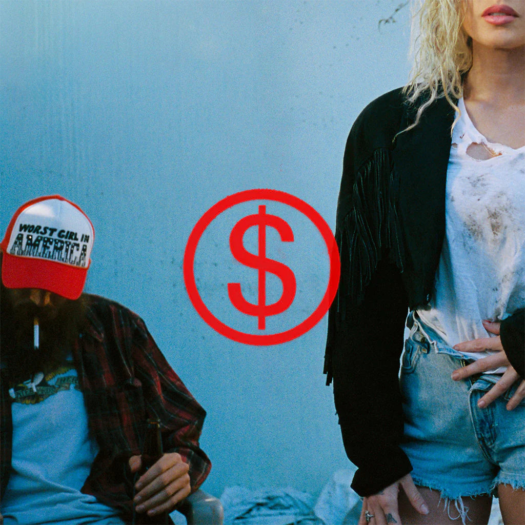 Two people sitting against a blue wall with a red dollar sign symbol.