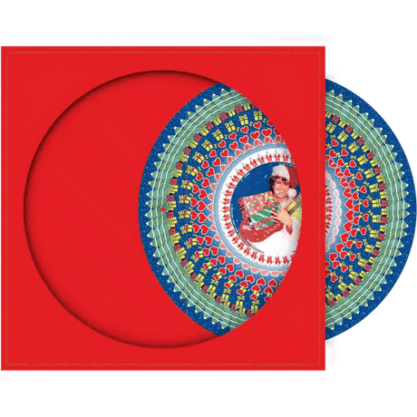 Decorative box with a colorful design and a person holding a book on a red background