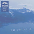 Album cover for 'The One Day LP' by Tate McRae with a blue sky and cloud design.