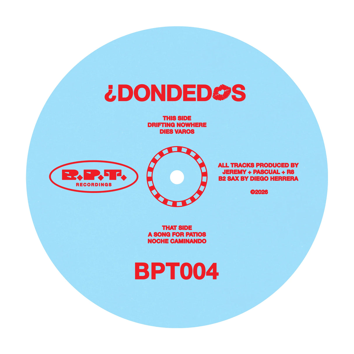 A light blue vinyl record label with red text, featuring the artist name '¡DONDEDOS' and track information for 'This Side' and 'That Side'.