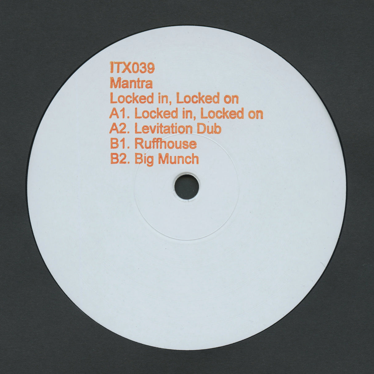 Vinyl record label with text on a dark background