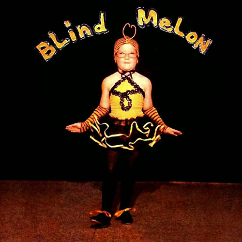 Album cover of Blind Melon featuring a child with arms outstretched wearing a costume with the band's name illuminated above.