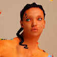 Album cover featuring a close-up portrait of FKA Twigs with a vibrant, textured background.
