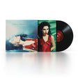 A vinyl LP record of PJ Harvey's album 'To Bring You My Love' with a picture of PJ Harvey lying down in a pool on the cover.