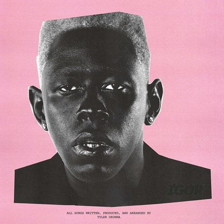 Album cover art for Tyler, The Creator's Igor 2LP featuring a black and white photograph of Tyler's face on a pink background.