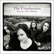 The Cranberries band members in black and white photo, with Dolores O'Riordan in the foreground and the band in the background, titled 'Dreams The Collection'.