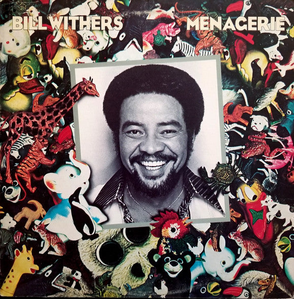 Album cover of 'Menagerie' by Bill Withers featuring a black and white photograph of Bill Withers surrounded by colorful animal illustrations.