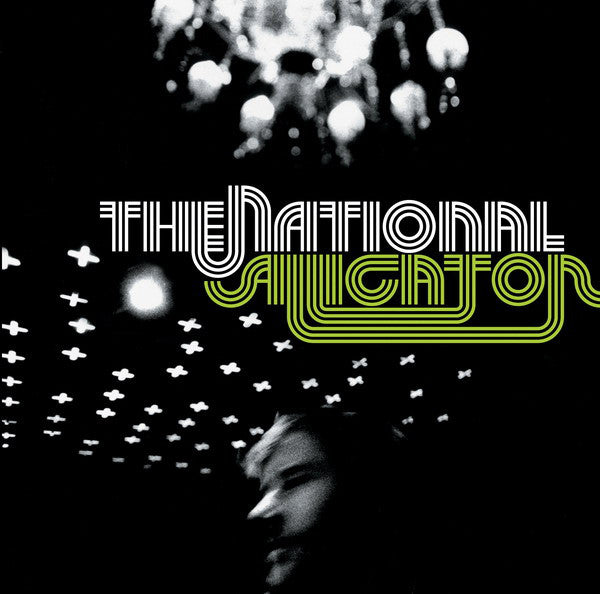 Album cover for The National's 'Alligator' featuring a stylized image of a person with a record player and vinyl records, with the band's name in bold lettering.