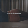 This image presents the album cover for "Lost In Translation (Music From The Motion Picture Soundtrack) LP." The cover features a minimalist design with a photograph of a person lying down, partially covered by a sheet, evoking a sense of孤独和reflection.