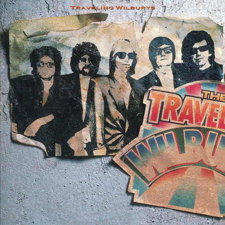 Album cover of 'Traveling Wilburys - Volume One LP' featuring a collage of photos with five members of the band The Traveling Wilburys.