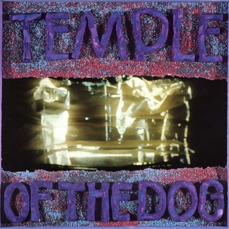 Record cover of Temple Of The Dog album featuring a blurred image of a concert with the band members and the title text in stylized font.