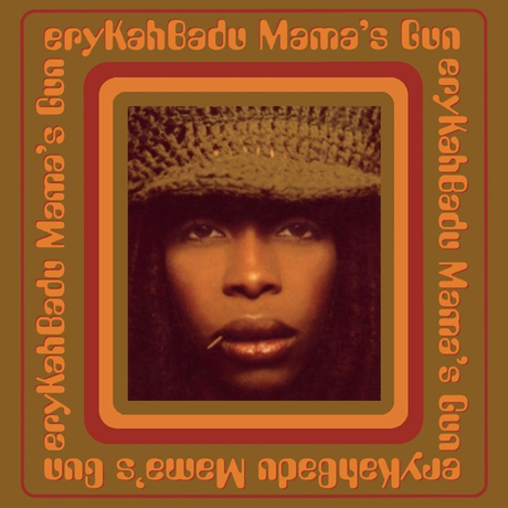 Album cover for Erykah Badu's 'Mama's Gun' featuring a photo of Erykah Badu in a hat with a reddish-orange color scheme.