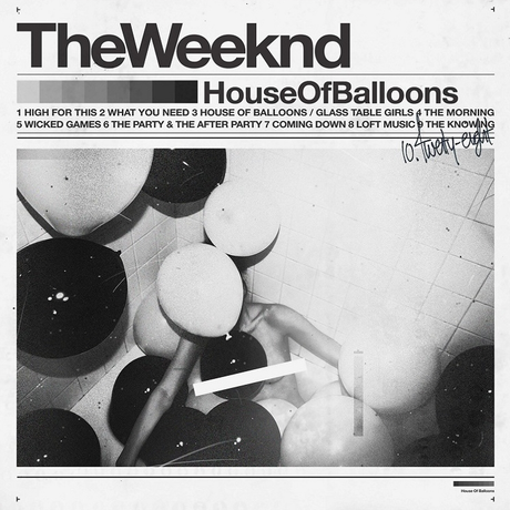 The image shows the album cover of 'The Weeknd - House Of Balloons 2LP'. It features a black and white photograph of The Weeknd sitting at a table with balloons, with a pen and paper.