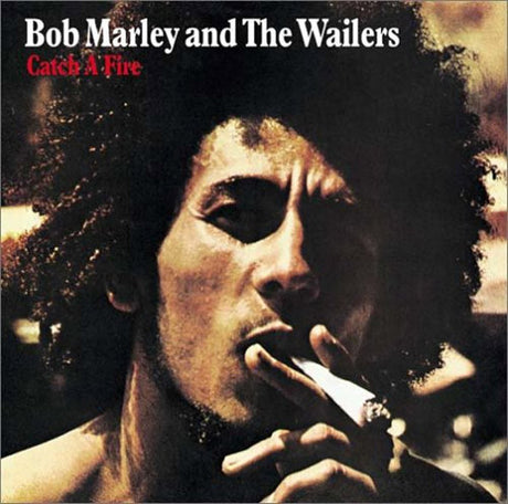 The image features the album cover for "Bob Marley and The Wailers - Catch A Fire LP (180g)." The cover displays a striking portrait of Bob Marley, showcasing his iconic curly hair and a serious expression.
